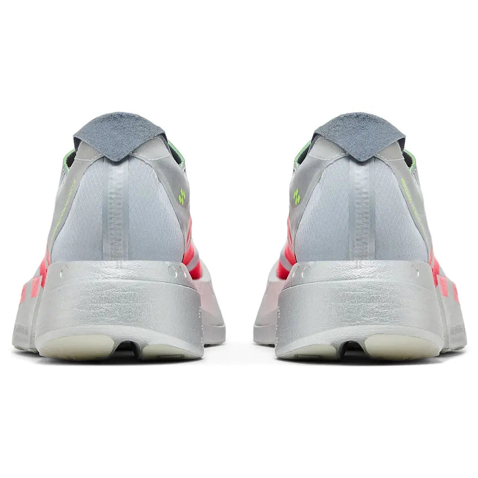 Rear view of silver and neon running sneakers with thick midsole and modern design
