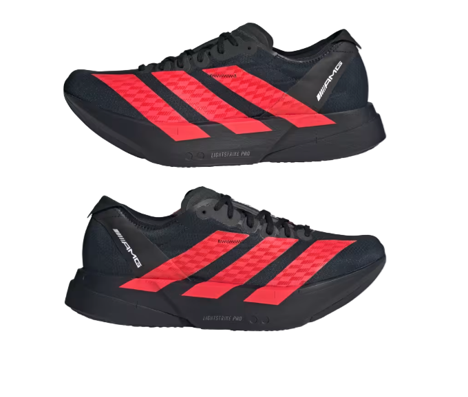 Black and red athletic shoes with quilted design on a light gray background