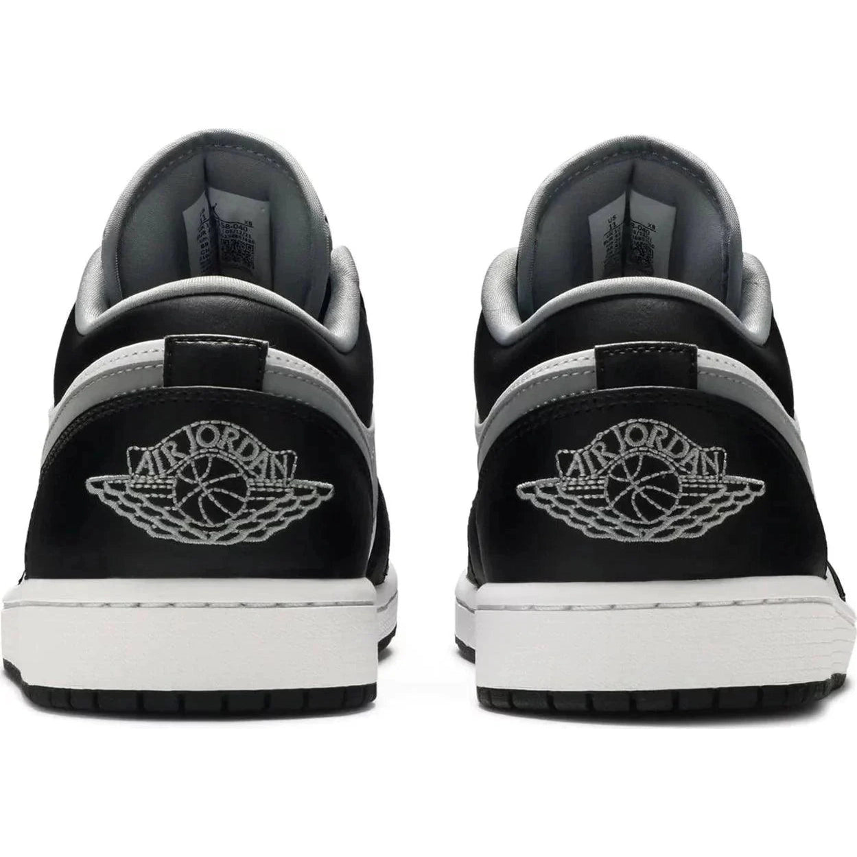 Back view of Air Jordan 1 Low Particle Grey sneakers with embroidered Wings logo.