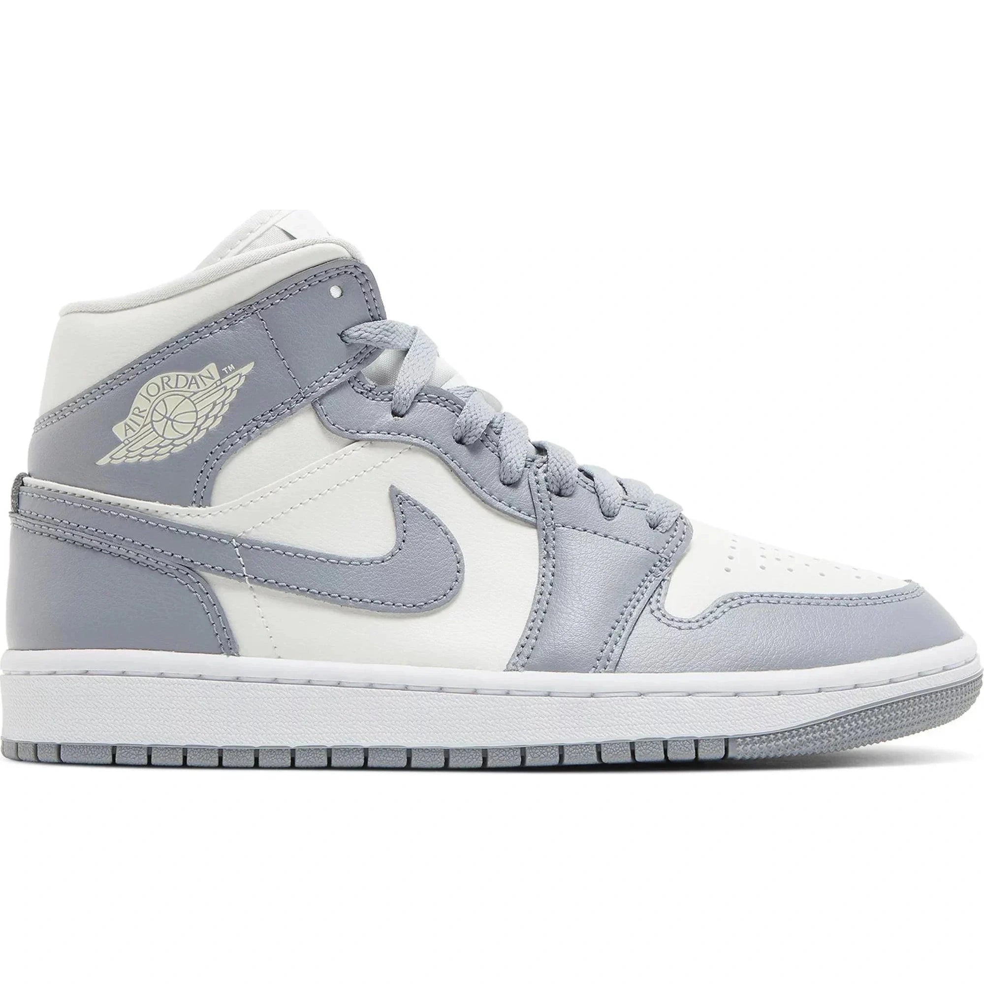 Air Jordan 1 Mid Stealth sneaker in white and grey leather, side profile view
