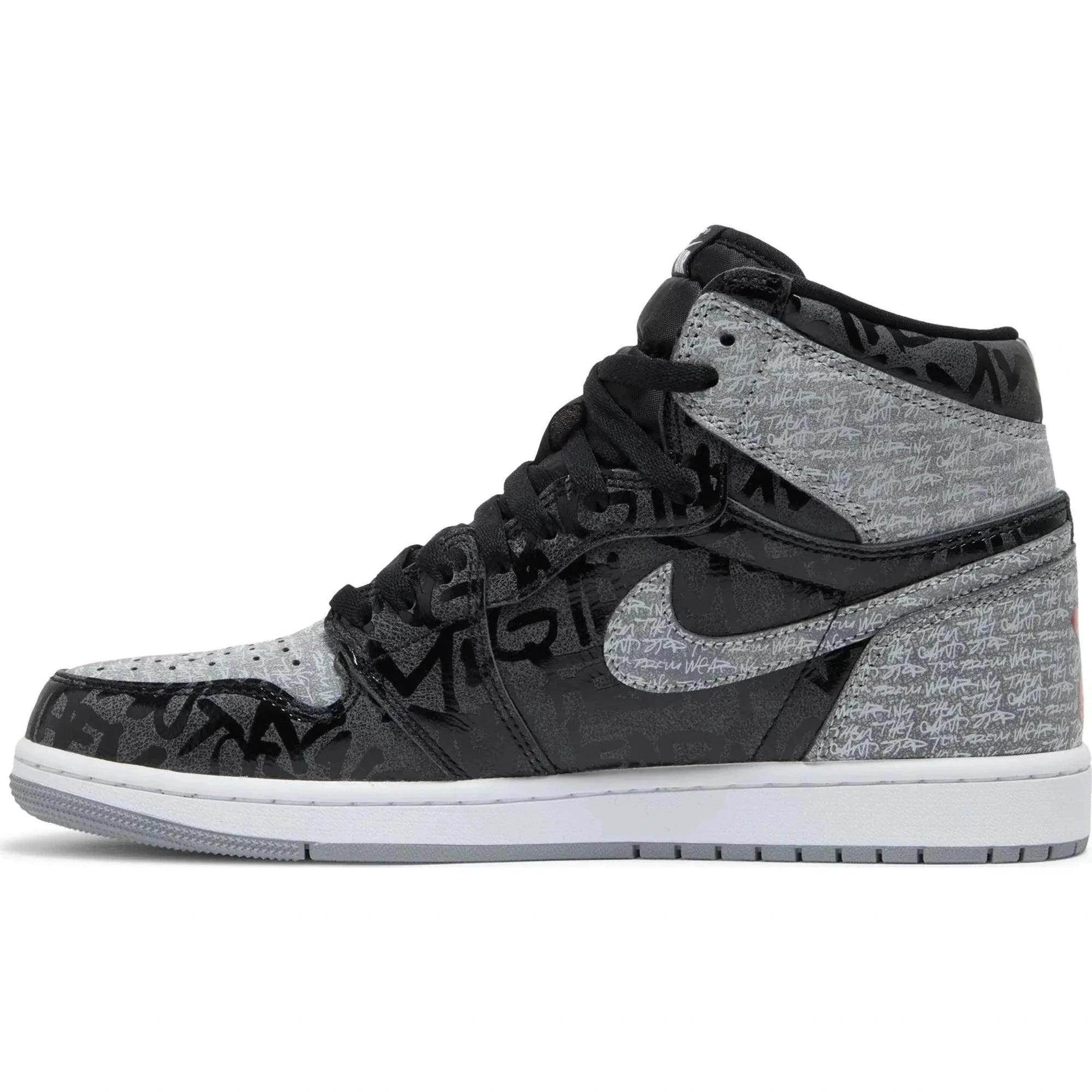 Black and grey Air Jordan 1 Retro High OG Rebellionaire sneaker with graffiti print