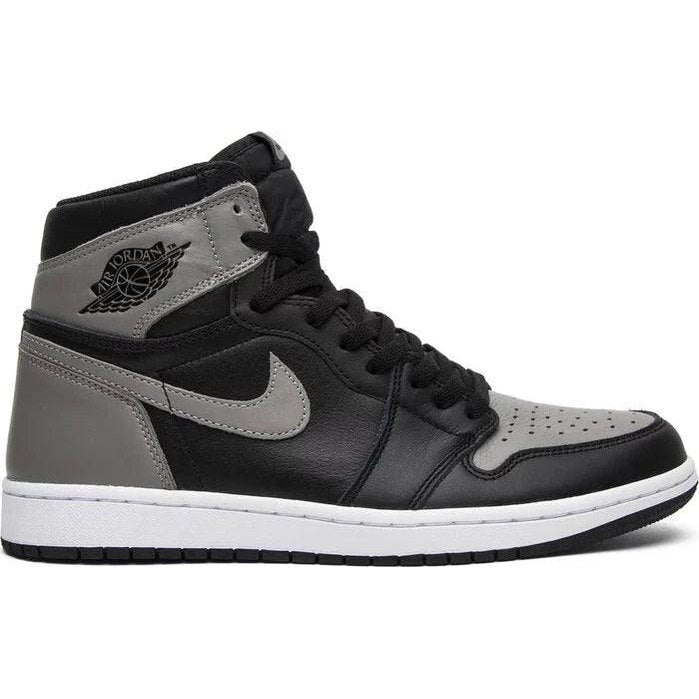 Black and grey high-top sneaker with leather upper and white sole, classic streetwear style.