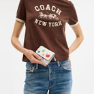 Coach Mila Small Flap Wallet With Sticker Print Brass Chalk Multi