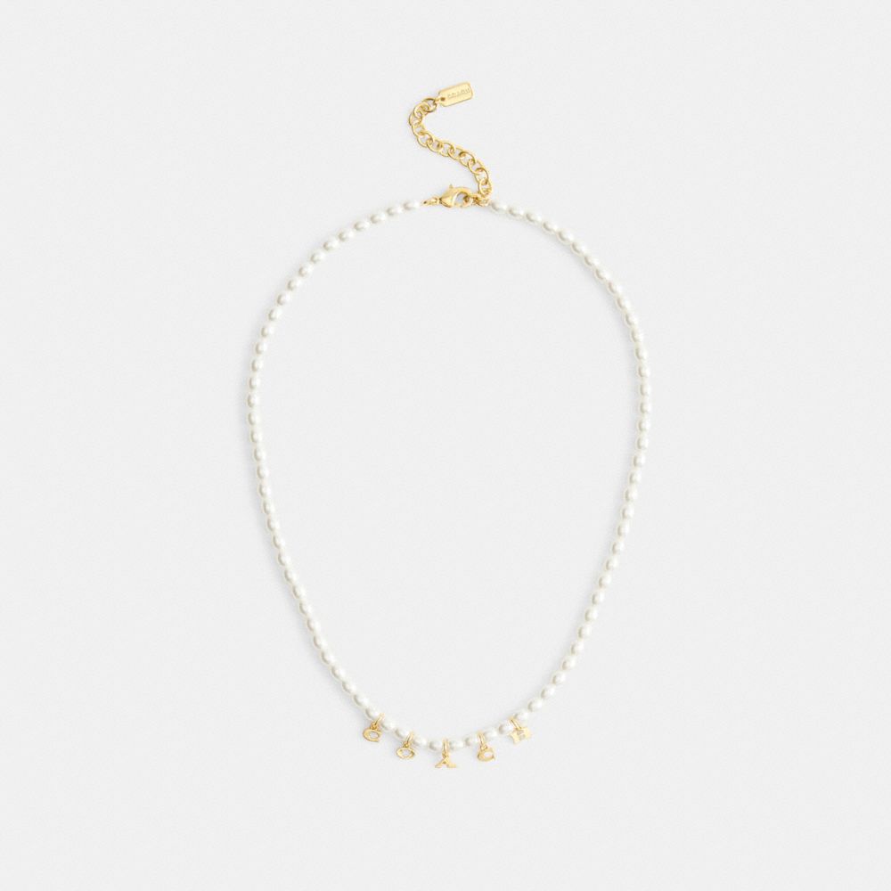 Coach Coach Charms Pearl Necklace Gold Pearl