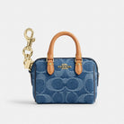Coach Mini Rowan Bag Charm In Signature Denim Gold Indigo