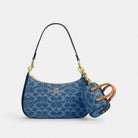 Coach Mini Rowan Bag Charm In Signature Denim Gold Indigo