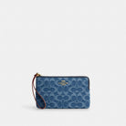 Coach Large Corner Zip Wristlet In Signature Denim Gold Indigo