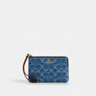 Coach Corner Zip Wristlet In Signature Denim Gold Indigo