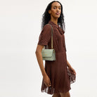 Coach Mini Klare Crossbody Bag With Floral Print Gold Pale Green