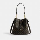 Coach Rowan Bucket Bag In Loved Signature Canvas With Charms Gold Brown
