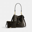 Coach Rowan Bucket Bag In Loved Signature Canvas With Charms Gold Brown