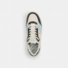 Women's Coach Soho Sneaker With Patent Signature Sea Mist Black.