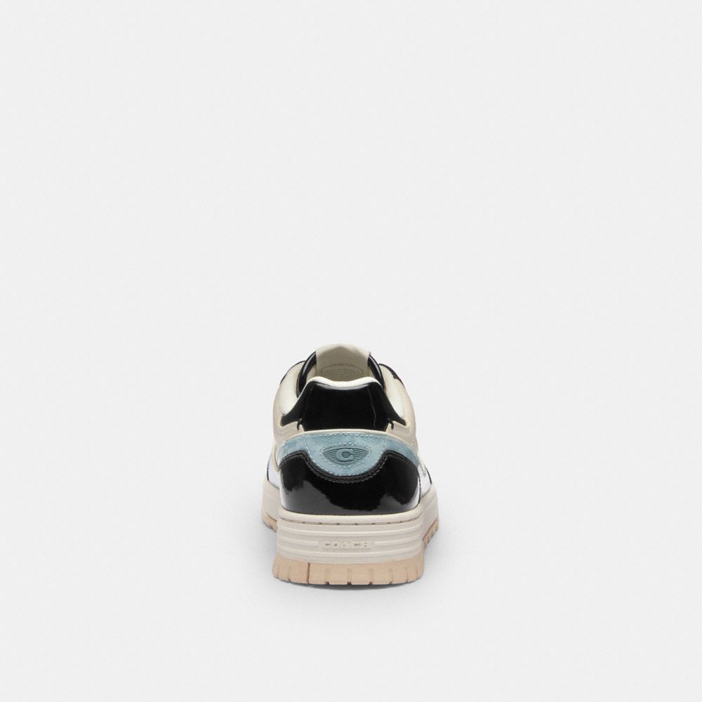 Women's Coach Soho Sneaker With Patent Signature Sea Mist Black.