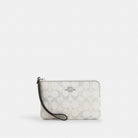 Coach Corner Zip Wristlet In Signature Canvas Silver Chalk Blue