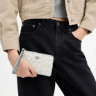 Coach Corner Zip Wristlet In Signature Canvas Silver Chalk Blue