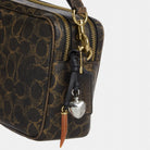 Coach Carey Crossbody Bag In Loved Signature Canvas With Charms Gold Brown