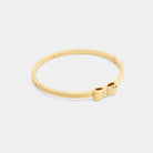 Coach Bow Hinged Bangle Gold