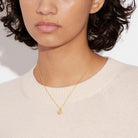 Coach Signature Crystal Pearl Pendant Necklace Gold