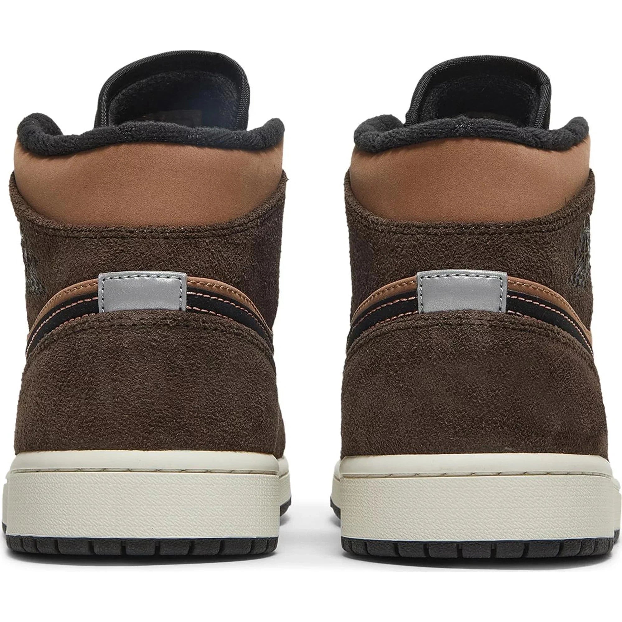 Rear view of brown suede high-top sneakers with black accents and white soles