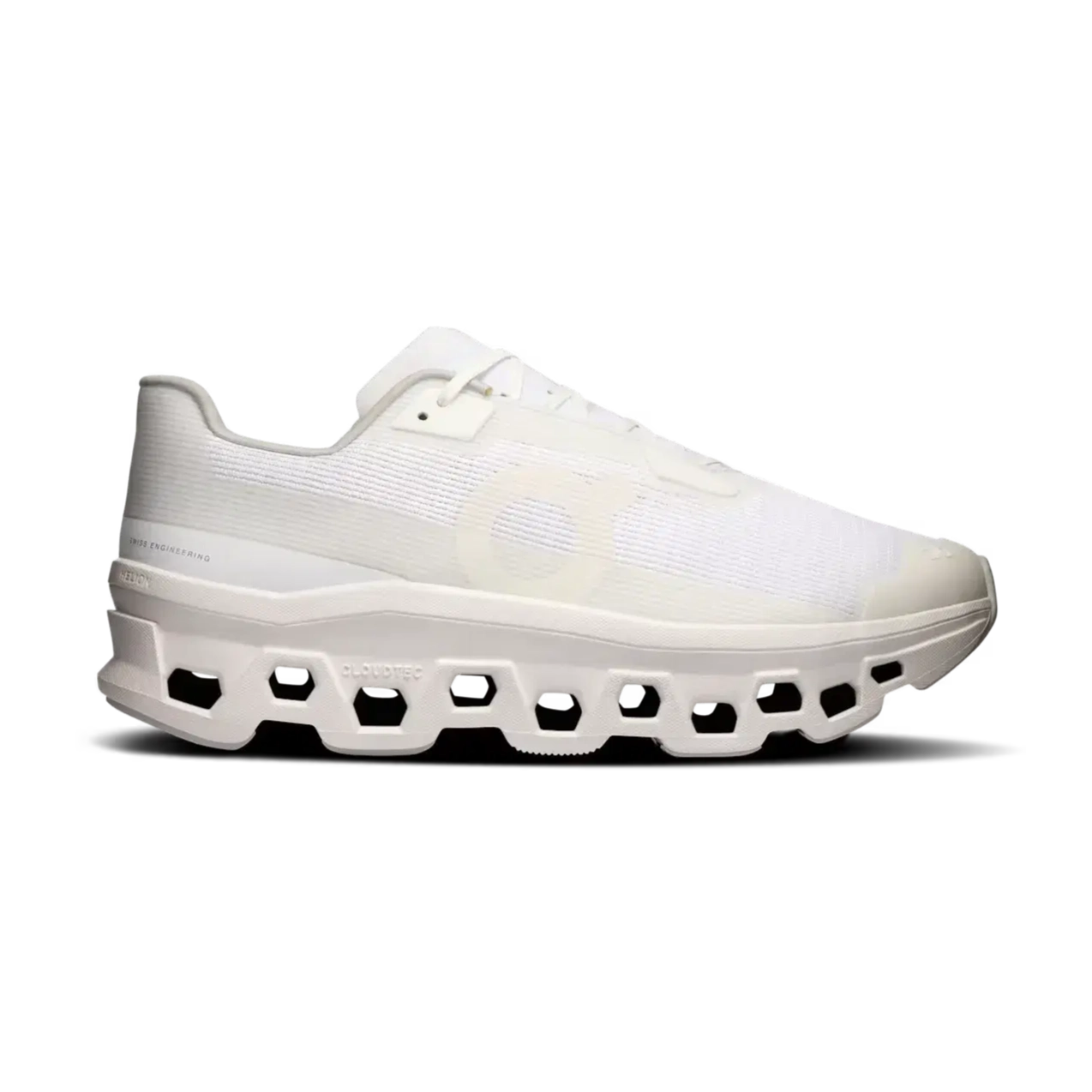 White streetwear sneaker with mesh upper and futuristic cut-out sole design