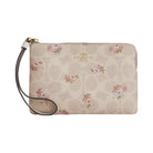 Coach Corner Zip Wristlet In Signature Canvas With Floral Print in Gold Sand Multi