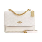 Coach Klare Crossbody Bag In Signature Canvas in Gold White Chalk