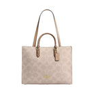 Coach Maggie Tote Bag In Blocked Signature Canvas in Gold Sand Tan