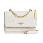 Coach Mini Klare Crossbody Bag In Signature Canvas in Gold White Chalk