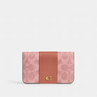 Coach Essential Slim Card Case In Signature Canvas Brass Melon Pink