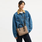 Coach Mollie Tote Bag 25 In Signature Canvas Gold Tan Black