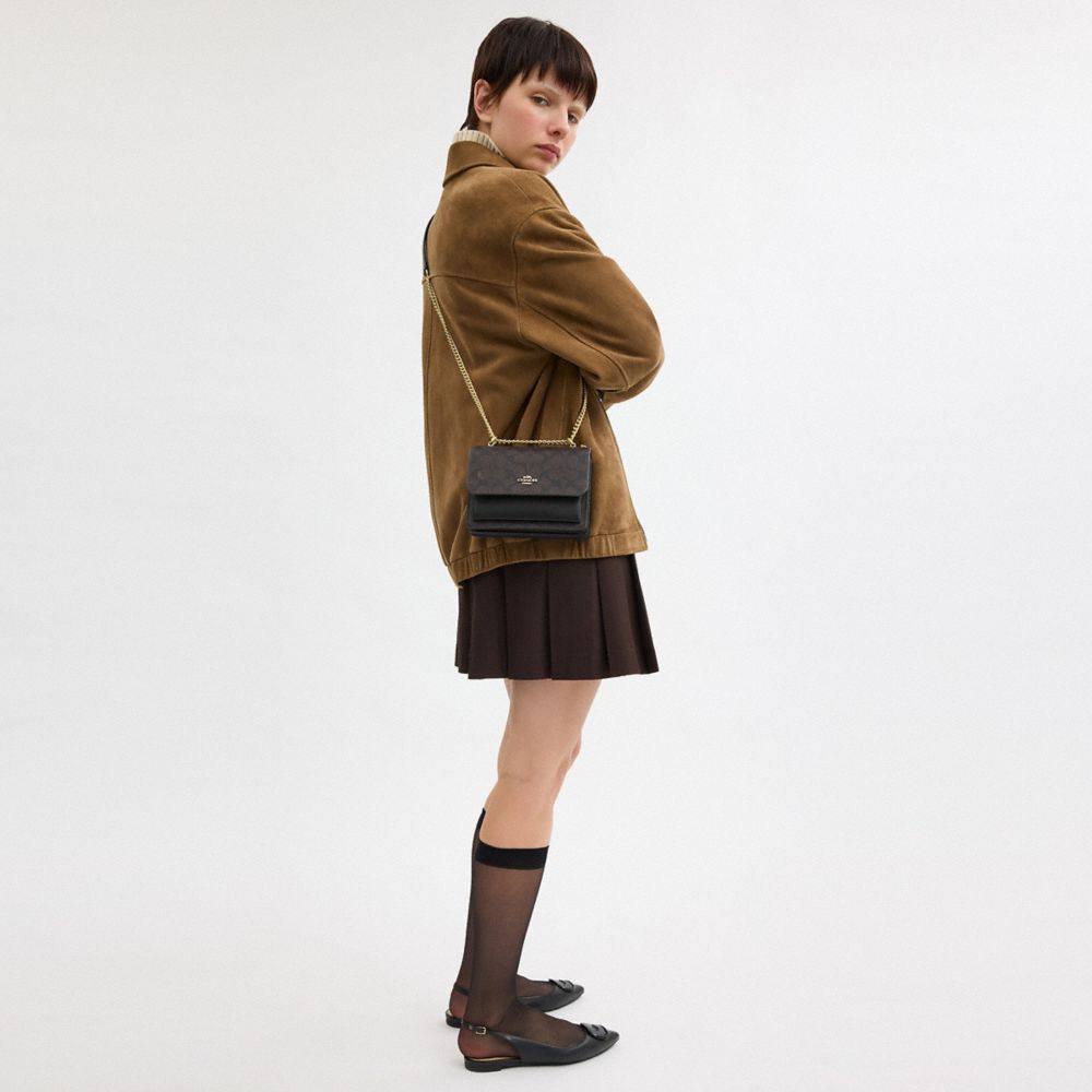 Coach Mini Klare Crossbody Bag In Signature Canvas Gold Walnut Black