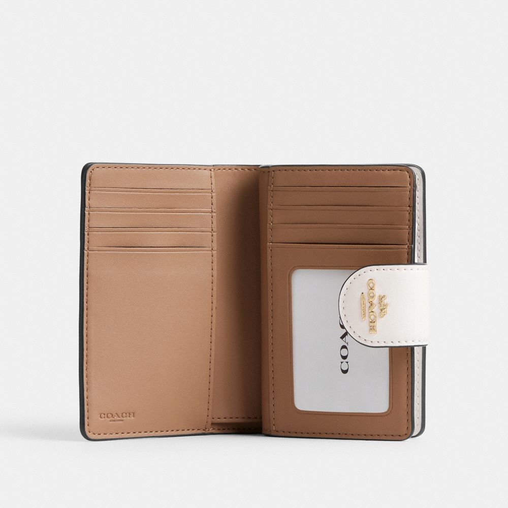 Coach Medium Corner Zip Wallet In Signature Canvas Gold Sand Chalk