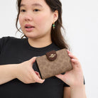 Coach Medium Corner Zip Wallet In Signature Canvas Gold Tan Brown