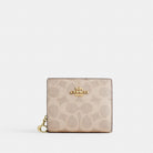 Coach Snap Wallet In Signature Canvas Gold Sand Chalk