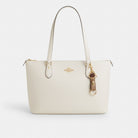 Coach Trigger Snap Bag Charm In Signature Canvas Gold Tan Brown