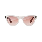 White wayfarer sunglasses with pink gradient lenses and black accents, streetwear style