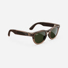 Brown wayfarer sunglasses with green lenses and logo on the temples, isolated on white background