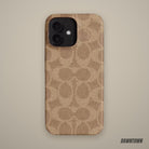 Coach iPhone 16 Case In Signature Canvas in Tan