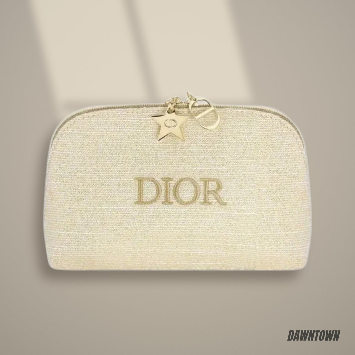 Lifestyle — Dior Holiday 2024 Makeup Pouch With Star And CD Logo Chain