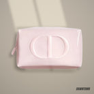 Lifestyle — Dior Pink Pouch Featuring Soft Pink Color And Prominent CD Logo