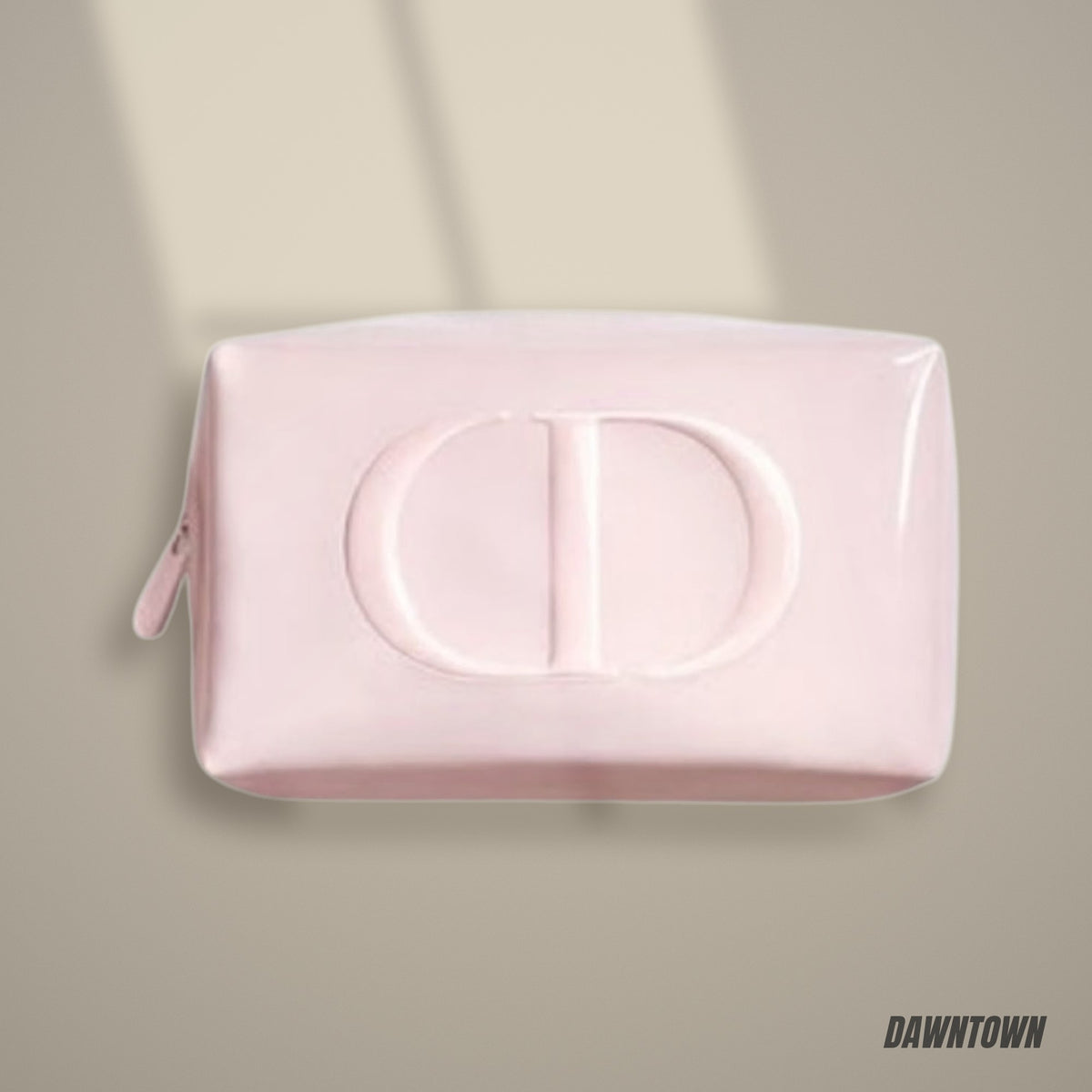 Lifestyle — Dior Pink Pouch Featuring Soft Pink Color And Prominent CD Logo