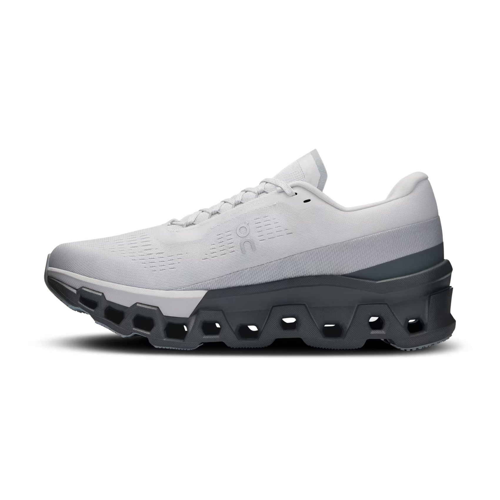 Modern white and gray low-top sneaker with chunky sole, streetwear athletic footwear