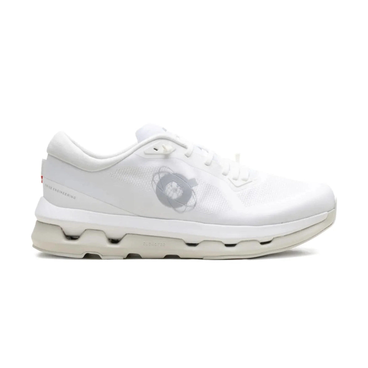 White designer sneaker with mesh upper, translucent side logo, and cushioned sole on white background
