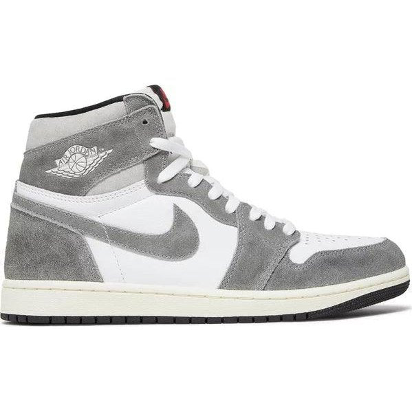 White and grey Air Jordan 1 Retro High OG sneaker with suede overlays and classic wing logo