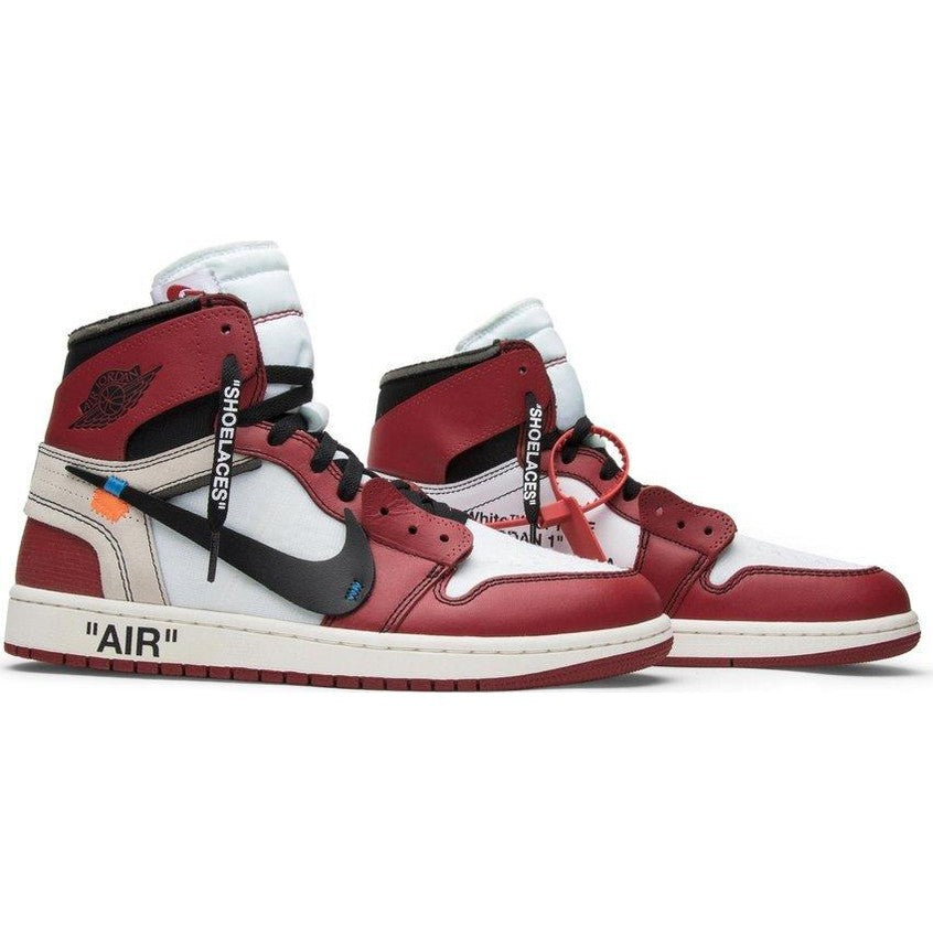 Red white and black high-top sneakers with black swoosh, unique detailing, and zip tie tag