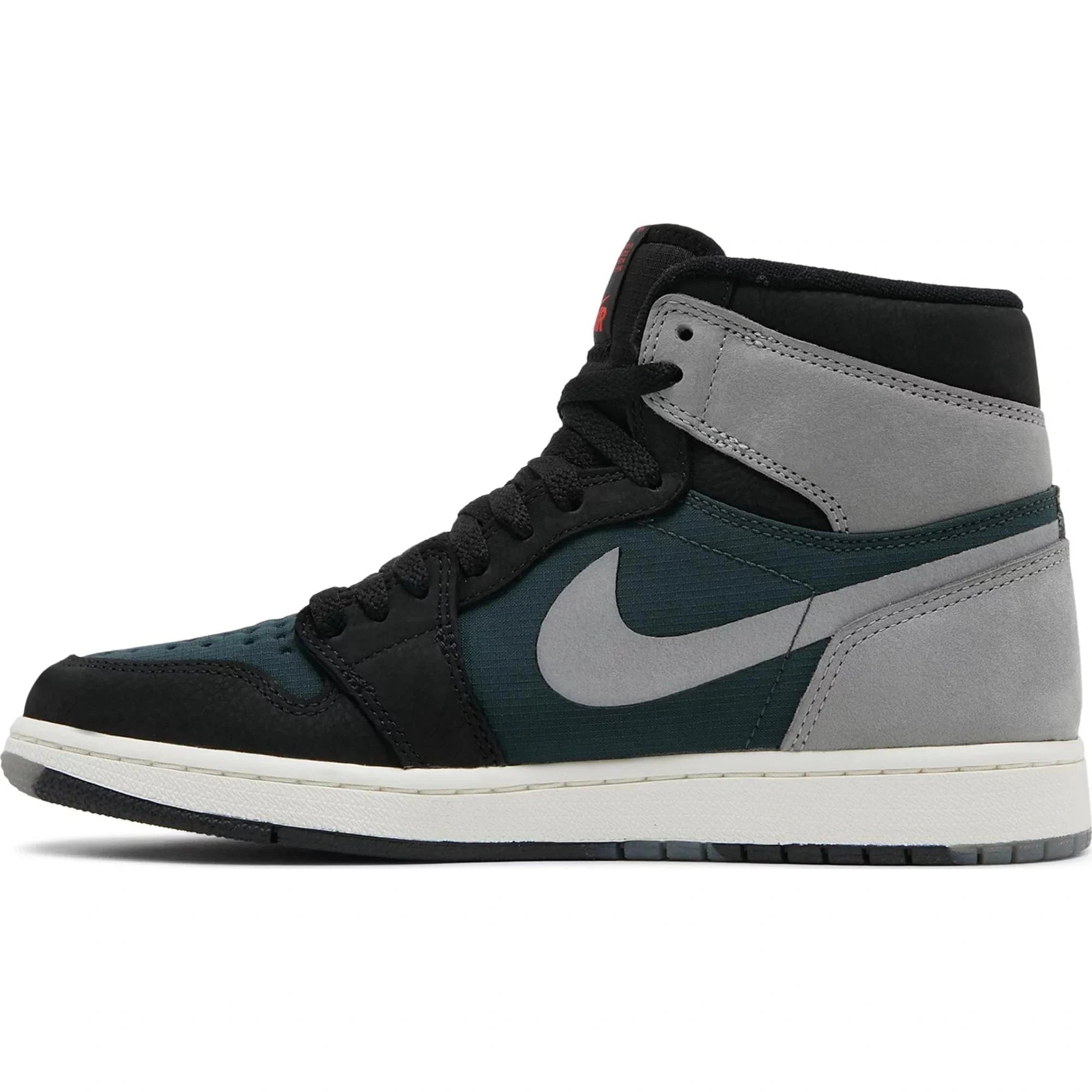 High-top black, grey, and dark green sneaker with suede and leather panels, side view