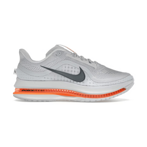 Gray Nike Air Zoom sneaker with orange air sole and black swoosh on white background
