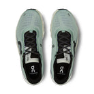 Top view of light blue On Cloudmonster sneakers with black laces and mesh uppers